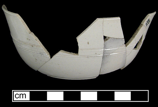 Cup with incised decoration. Recovered from Feature 4 &ndash; Kitchen hearth-front cellar, filled circa 1750 from 18CV91.